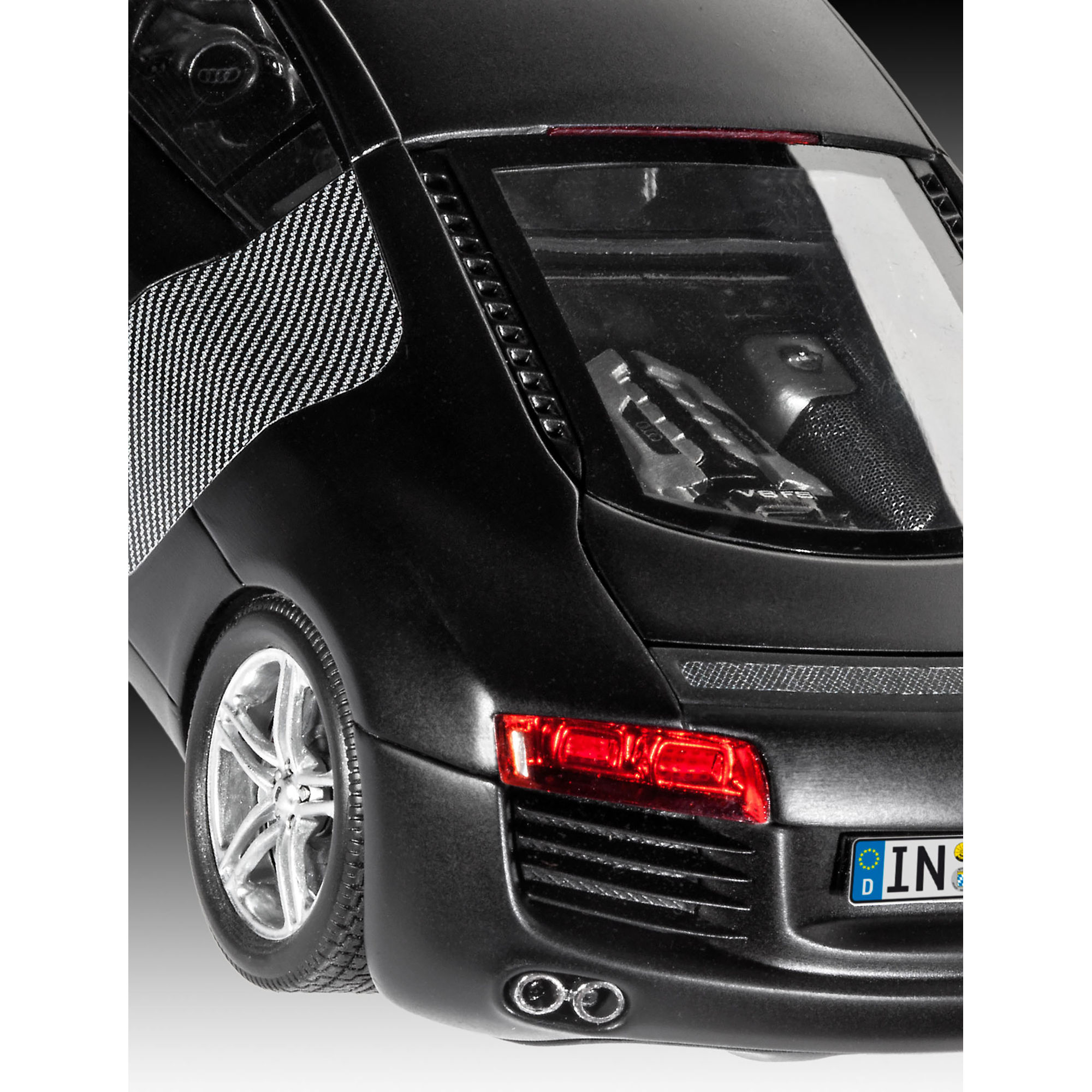 Tył modelu Audi R8 z widocznym silnikiem i tylnymi światłami